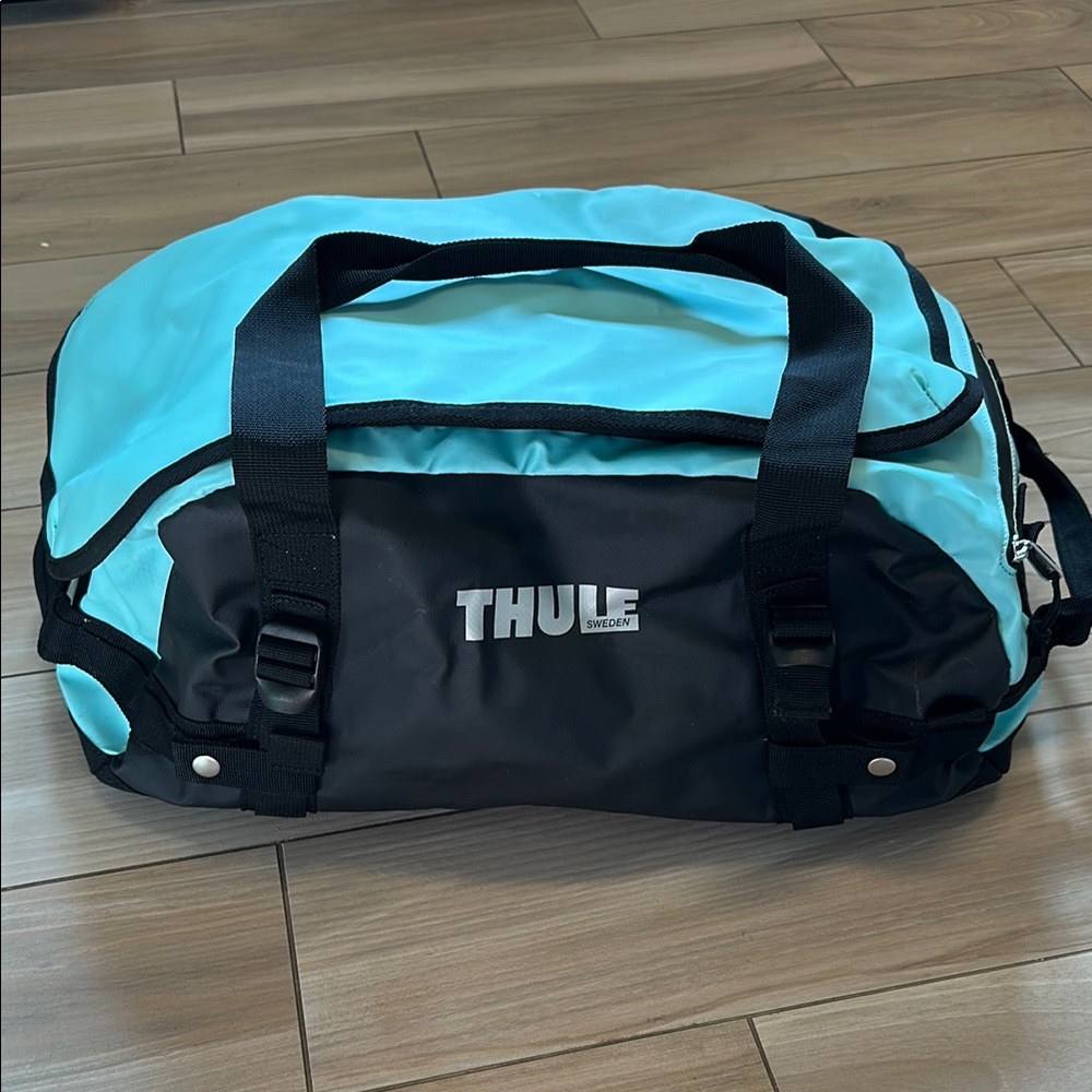 Thule Black and Blue Duffel Bag with Weather-Resistant Design Chasm Aqua